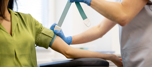 Woman having blood taken for a blood test to check annual biomarkers like iron, thyroid and inflammation.