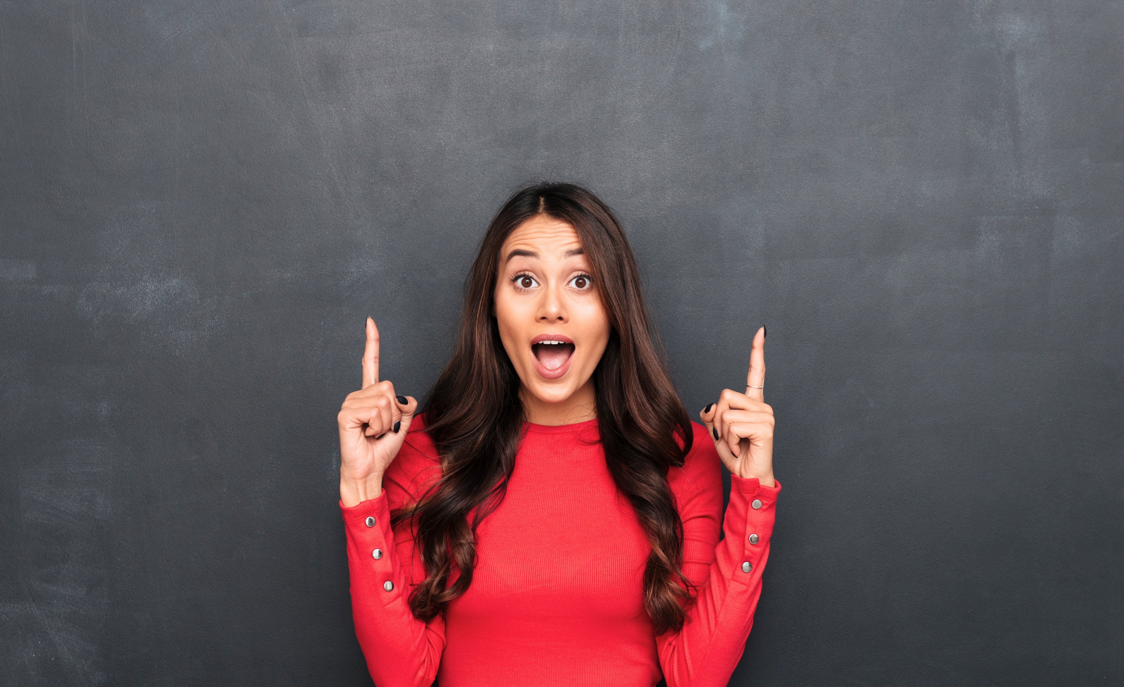 Current promotions banner – woman pointing up – shop Renew Health Co. offers and discounts.