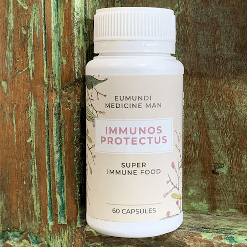 Eumundi Medicine Man Immunos Protectus herbal immune support bottle photographed at angle – superfood formula with antioxidants, vitamins and trace minerals.