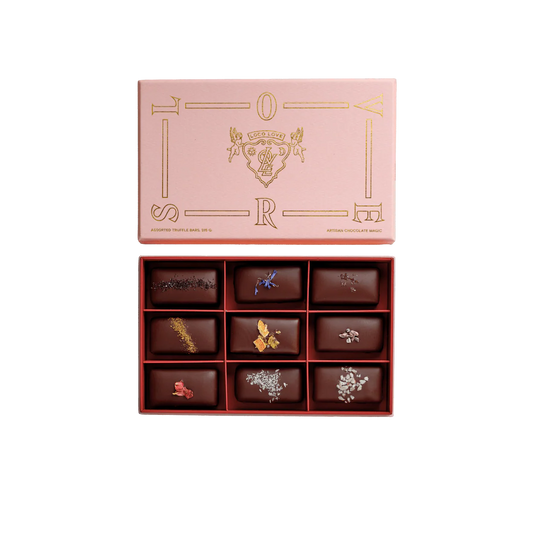 Loco Love Lovers Box – top view of opened vegan chocolate gift box showcasing assorted handcrafted organic cacao bars in elegant packaging.