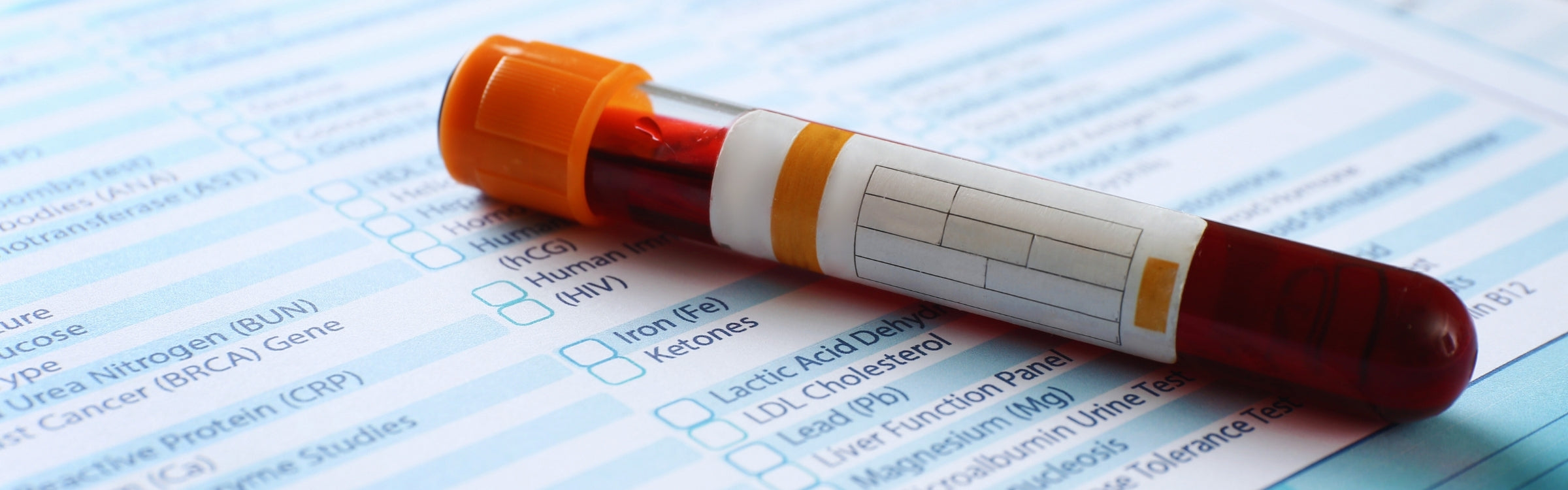 Blood sample tube on a medical form