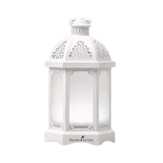 The Young Living Lantern Ultrasonic Diffuser is more than just a diffuser—it’s a beautifully crafted piece that combines function, wellness, and timeless design. Inspired by classic lanterns, this ultrasonic diffuser brings a warm ambiance and long-lasting essential oil mist to any room.

Crafted from metal and tempered glass, the Lantern Diffuser serves as a diffuser, humidifier, and atomiser—all in one. 